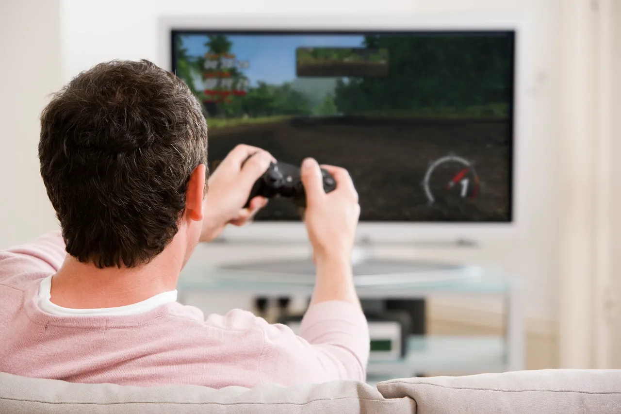 man playing video games