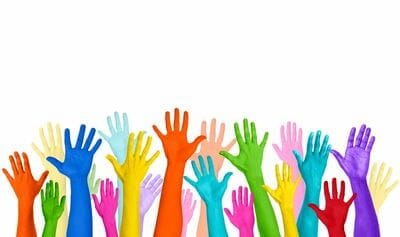multiple raised hands with different color in white background