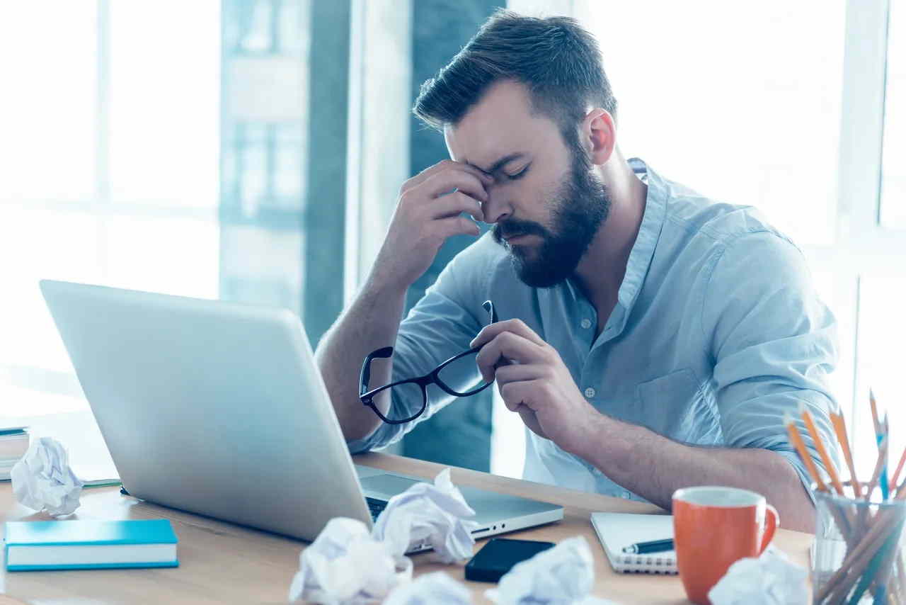 man stressed at work