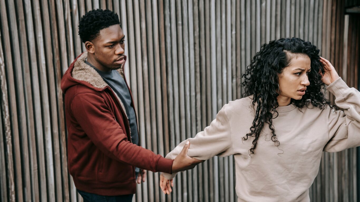 man and woman having an argument