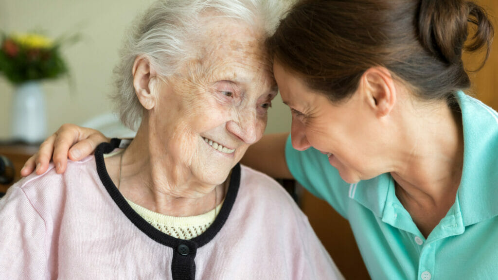 nurse caring for dementia patient